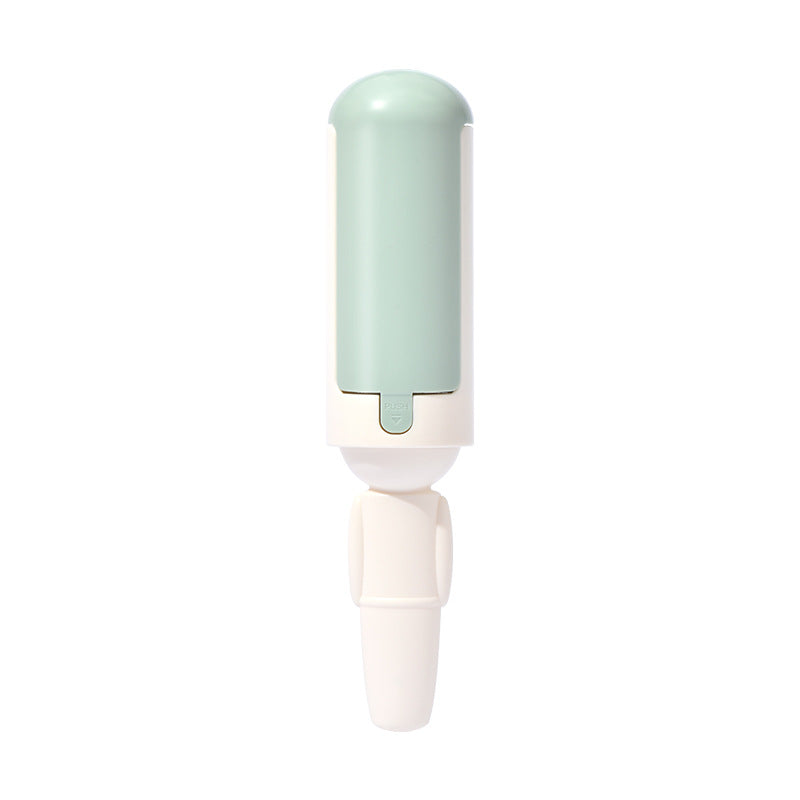 Mint and white reusable pet hair detail brush
